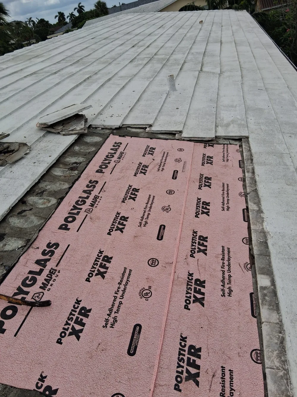 Insulation installed on a flat roof during waterproofing